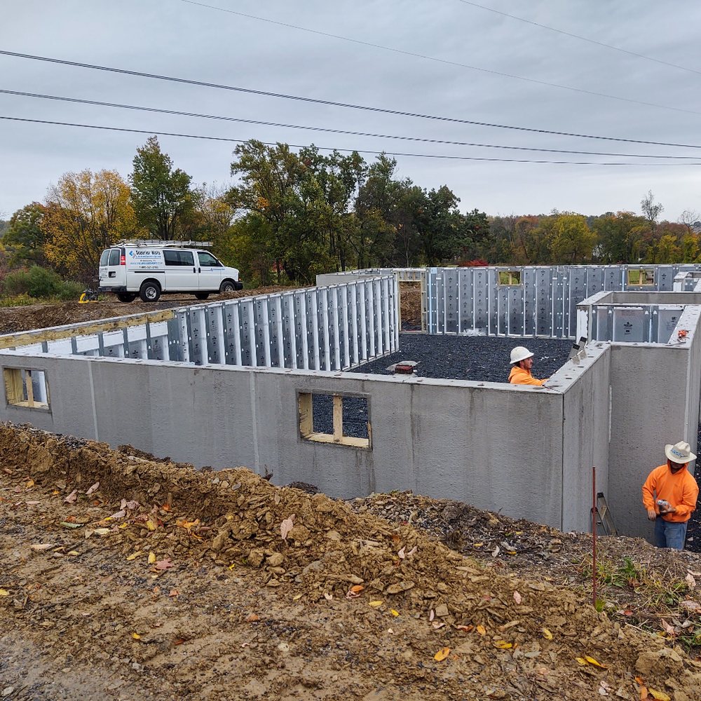 Poured concrete foundation walls for a new custom home build